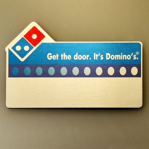 “Domino`s” badge by Vizinform